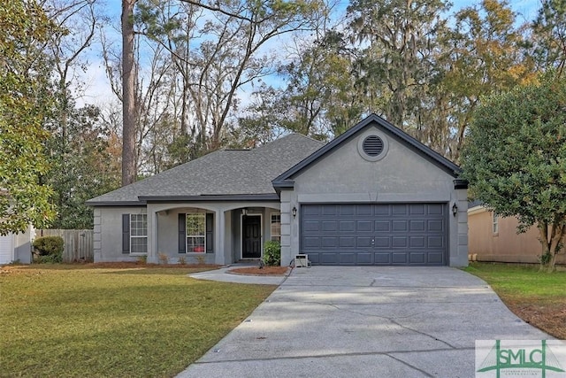 ranch-style home with a garage, concrete driveway, fence, a front yard, and stucco siding