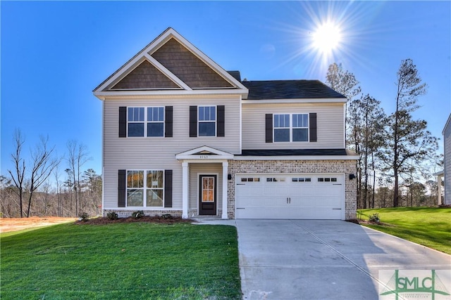 craftsman-style house featuring a garage, driveway, a front lawn, and brick siding