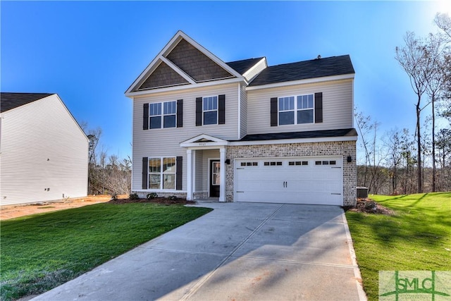 craftsman-style home with an attached garage, brick siding, driveway, and a front lawn