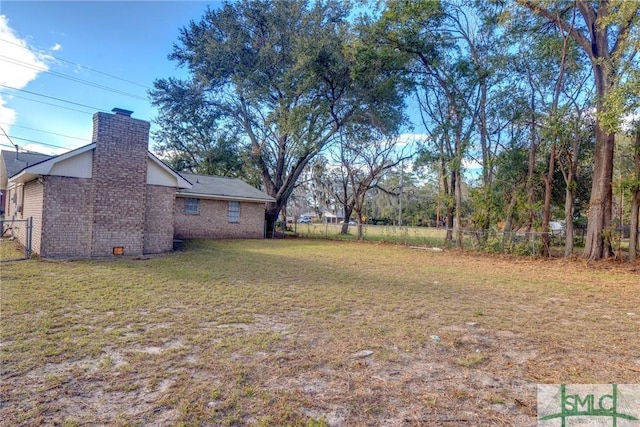 view of yard with fence