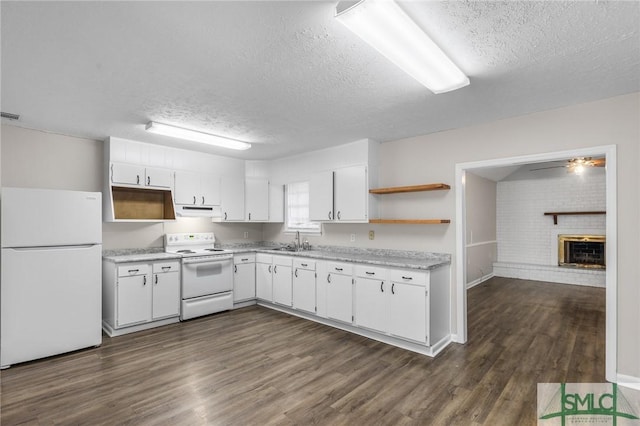 kitchen with open shelves, white appliances, a sink, and light countertops