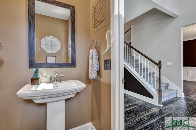 bathroom featuring wood finished floors