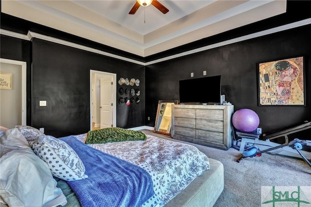 carpeted bedroom featuring a ceiling fan