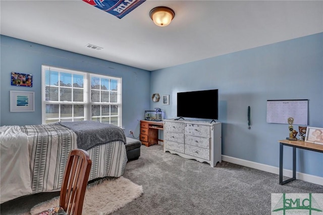 bedroom featuring baseboards, visible vents, and carpet flooring