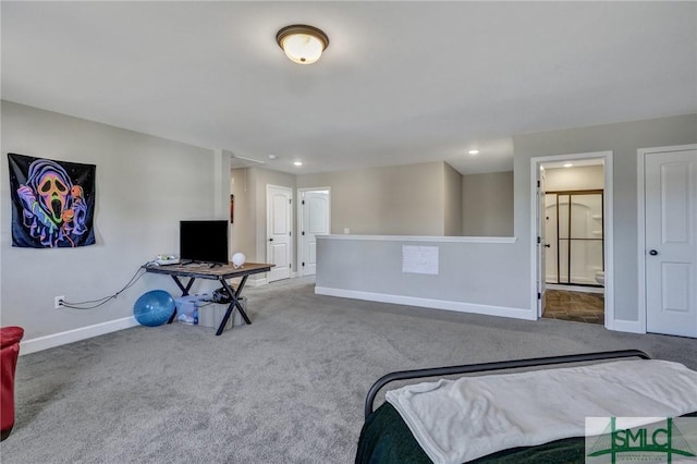 unfurnished bedroom with connected bathroom, baseboards, carpet flooring, and recessed lighting