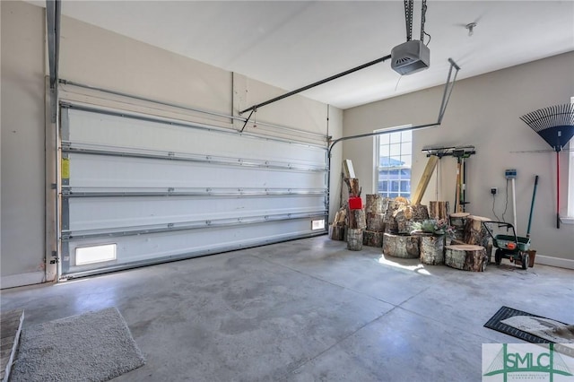 garage featuring baseboards and a garage door opener