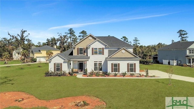 traditional-style house with a front lawn