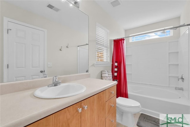 full bath with toilet, shower / bath combo, vanity, and visible vents