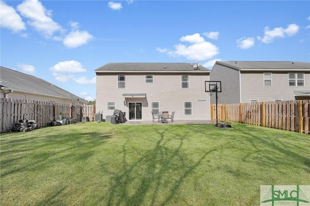 rear view of property with a patio area, a fenced backyard, a yard, and central air condition unit