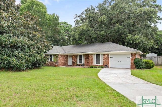 single story home featuring an attached garage, brick siding, fence, concrete driveway, and a front yard