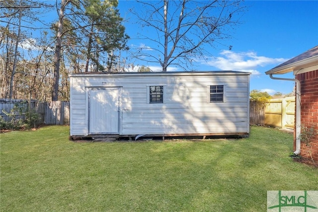 view of shed featuring a fenced backyard