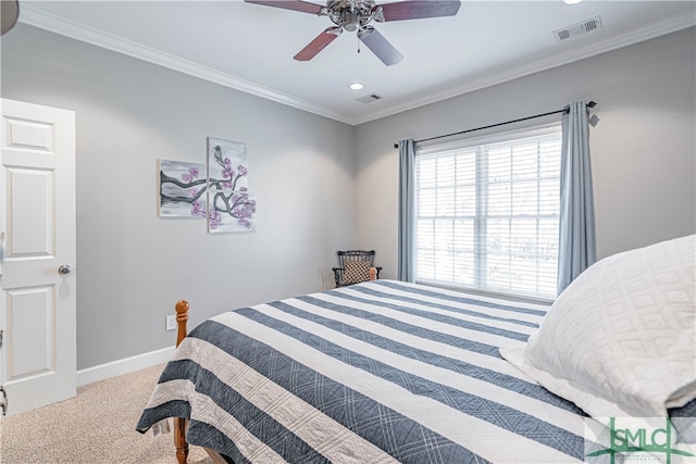 bedroom featuring baseboards, visible vents, ceiling fan, ornamental molding, and carpet floors