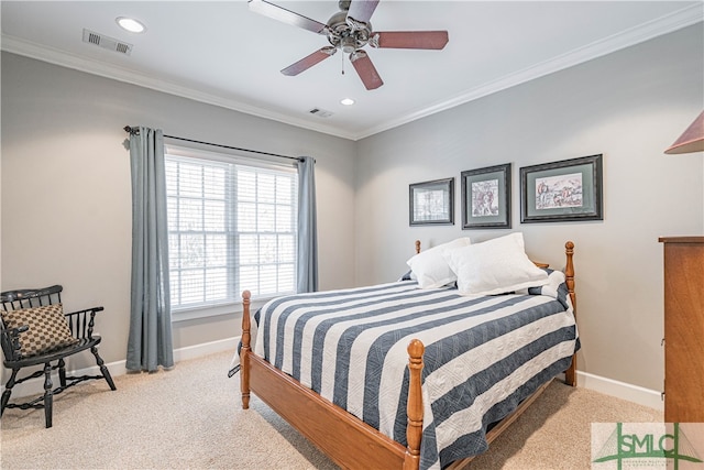 bedroom featuring light carpet, ornamental molding, visible vents, and baseboards