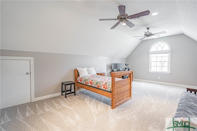 carpeted bedroom with lofted ceiling, ceiling fan, a textured ceiling, and baseboards