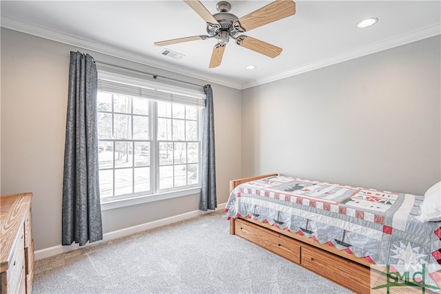 bedroom featuring baseboards, light carpet, visible vents, and crown molding