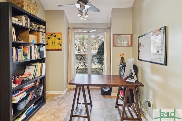 office area featuring light tile patterned floors, baseboards, and a ceiling fan