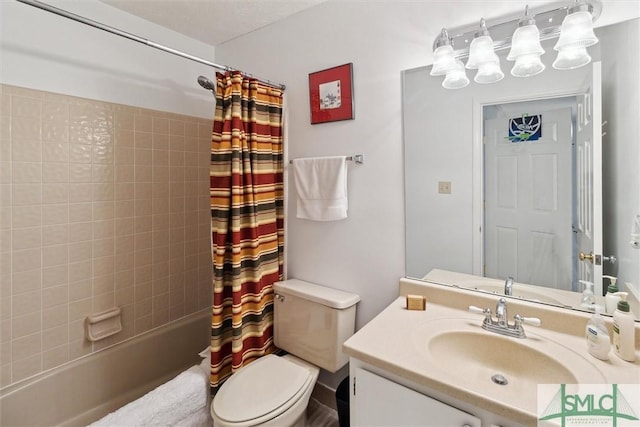 bathroom featuring shower / tub combo, vanity, and toilet