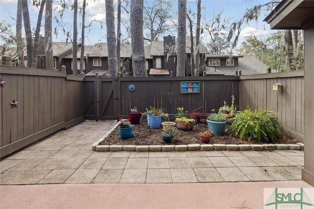 view of patio / terrace featuring a gate and a fenced backyard