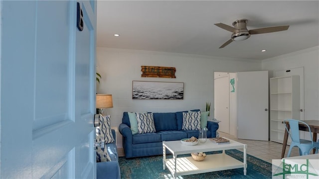 living area with ceiling fan, ornamental molding, tile patterned flooring, and recessed lighting