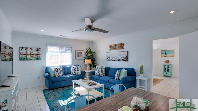 living room with ceiling fan, light tile patterned flooring, and crown molding