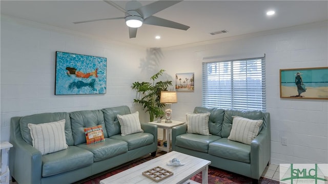 living area with ceiling fan, ornamental molding, visible vents, and recessed lighting