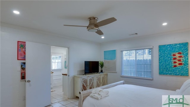 bedroom featuring ornamental molding, multiple windows, visible vents, and light tile patterned flooring