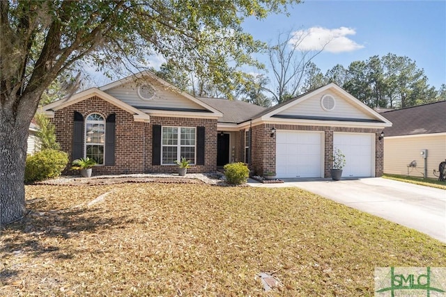 single story home with driveway, a front yard, a garage, and brick siding