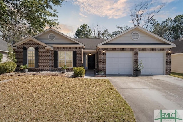 ranch-style house with an attached garage, a front lawn, concrete driveway, and brick siding