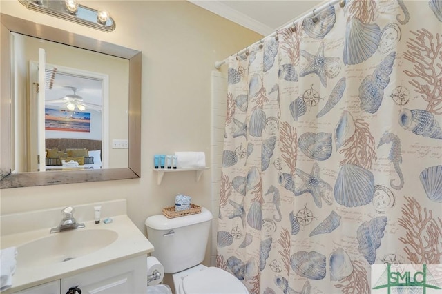 full bathroom featuring curtained shower, crown molding, vanity, and toilet