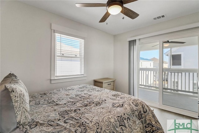 bedroom featuring access to exterior, ceiling fan, visible vents, and wood finished floors