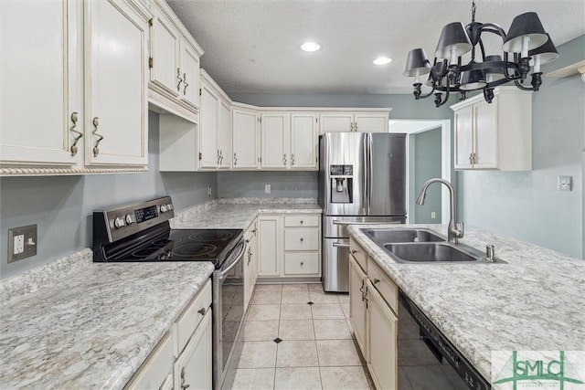 kitchen featuring light tile patterned floors, recessed lighting, stainless steel appliances, a sink, and an inviting chandelier