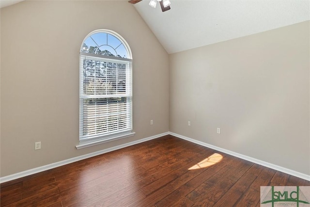 unfurnished room featuring lofted ceiling, ceiling fan, wood finished floors, and baseboards