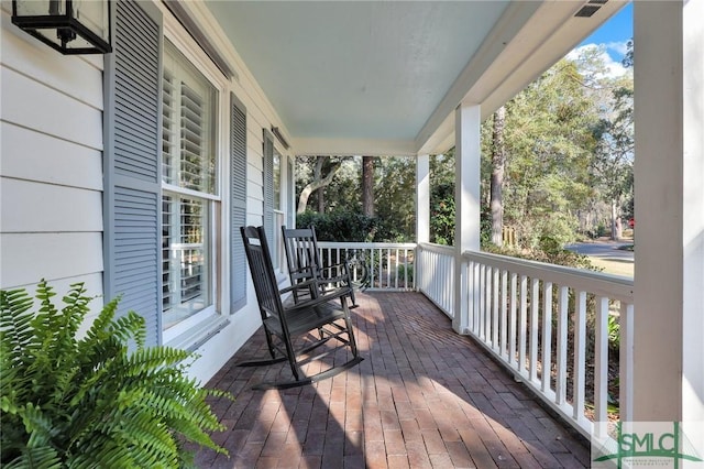 deck featuring covered porch