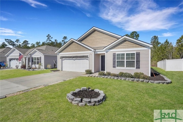 view of front of property with a garage, fence, driveway, and a front lawn