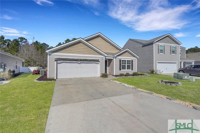 view of front of house featuring fence, a front lawn, and concrete driveway