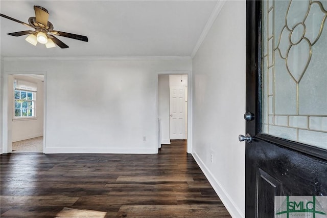 entrance foyer featuring ornamental molding, dark wood finished floors, baseboards, and a ceiling fan