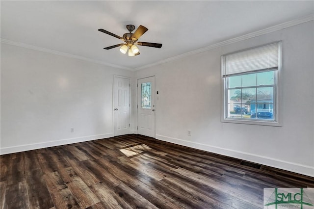 unfurnished room with dark wood-style floors, ceiling fan, ornamental molding, and baseboards