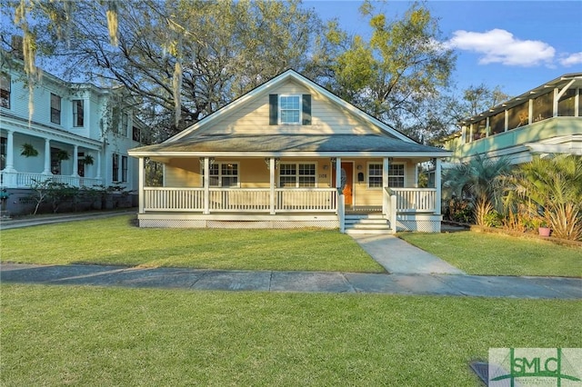 view of front facade with a porch and a front yard