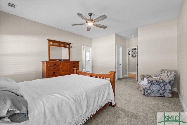 bedroom featuring ceiling fan, carpet, visible vents, and baseboards