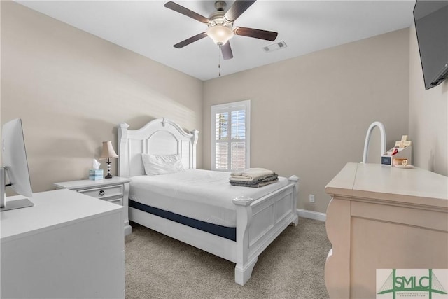 bedroom featuring visible vents, ceiling fan, light carpet, and baseboards