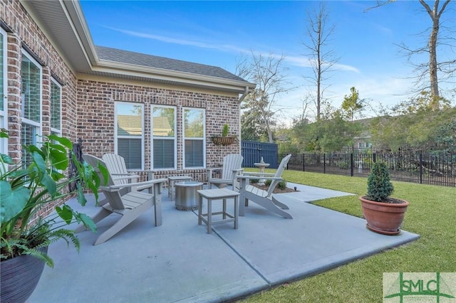 view of patio featuring fence