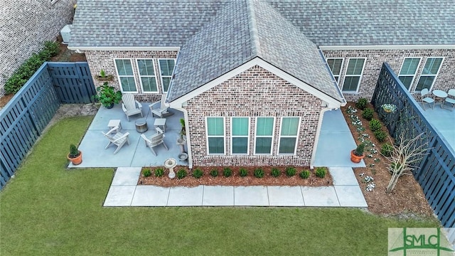 exterior space featuring a patio and a fenced backyard