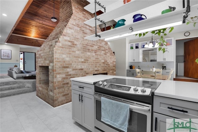 kitchen featuring brick wall, wood ceiling, electric stove, gray cabinets, and open shelves