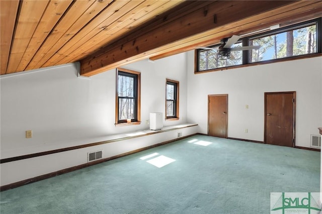 interior space featuring carpet floors, plenty of natural light, and visible vents