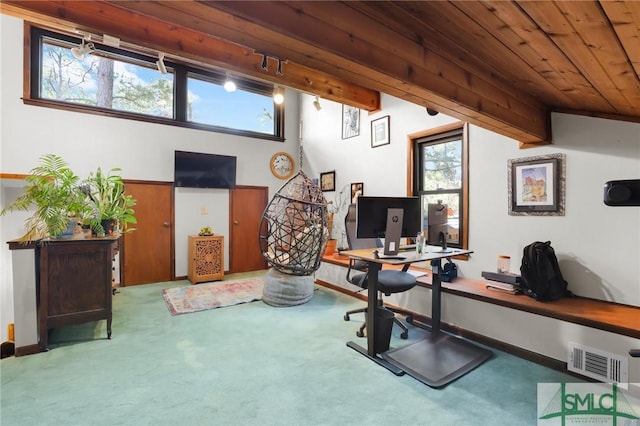 carpeted office space featuring wooden ceiling, visible vents, lofted ceiling with beams, and baseboards