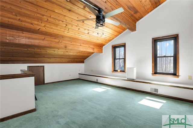 additional living space featuring wood ceiling, visible vents, baseboards, and carpet flooring