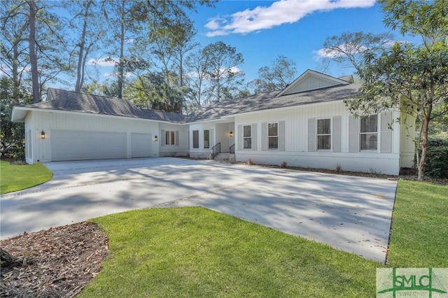 single story home featuring a garage, a front yard, driveway, and a shingled roof