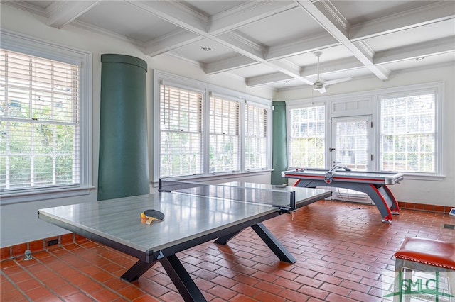 playroom featuring ornamental molding, beamed ceiling, visible vents, and baseboards