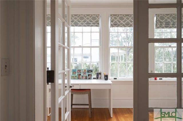 entryway with light wood finished floors