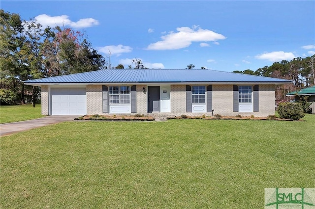 ranch-style home featuring a garage, brick siding, driveway, and a front yard